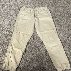 Tan jogger pants. WORN BUT NO FLAWS.